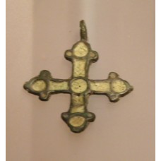 Cross pendant with circles on each tip